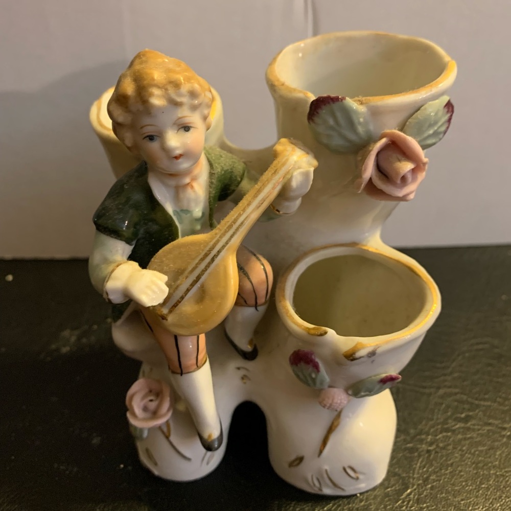 Vintage Boy playing vase